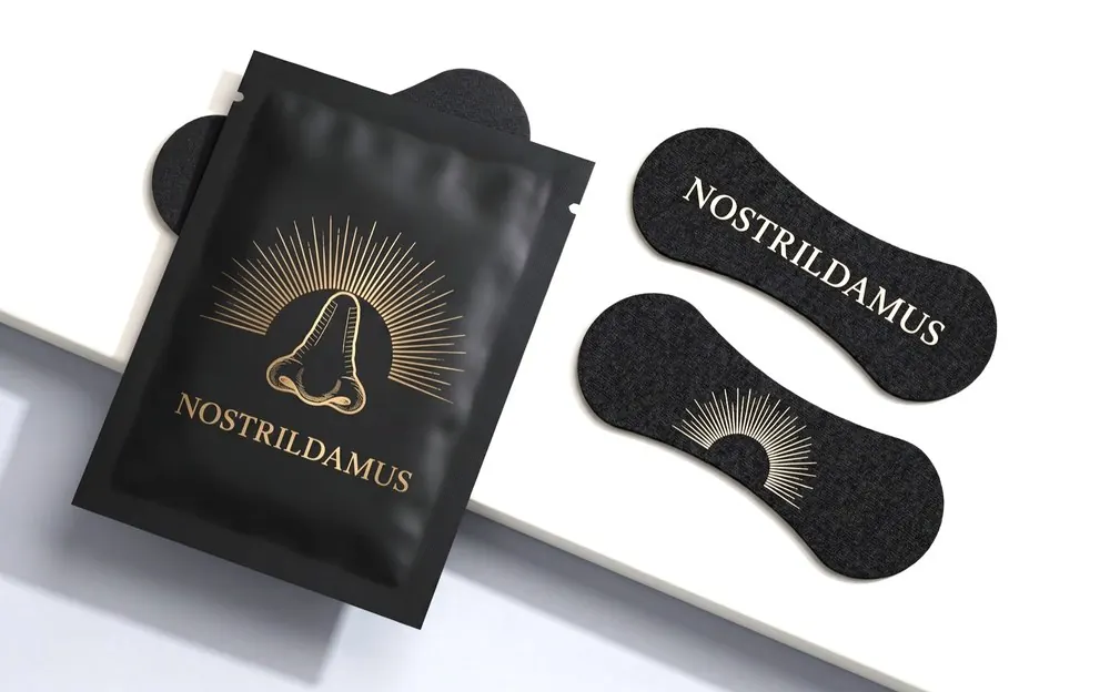 Black Nostrildamus nasal strips and their foil sachet